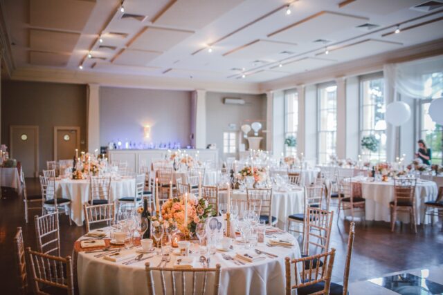 A large room with many tables and chairs