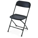 A black folding chair is shown with no back.