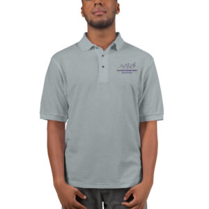 A man wearing a polo shirt with the words " the best is yet to be ".