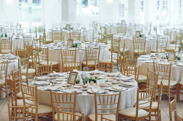 A large room with many tables and chairs